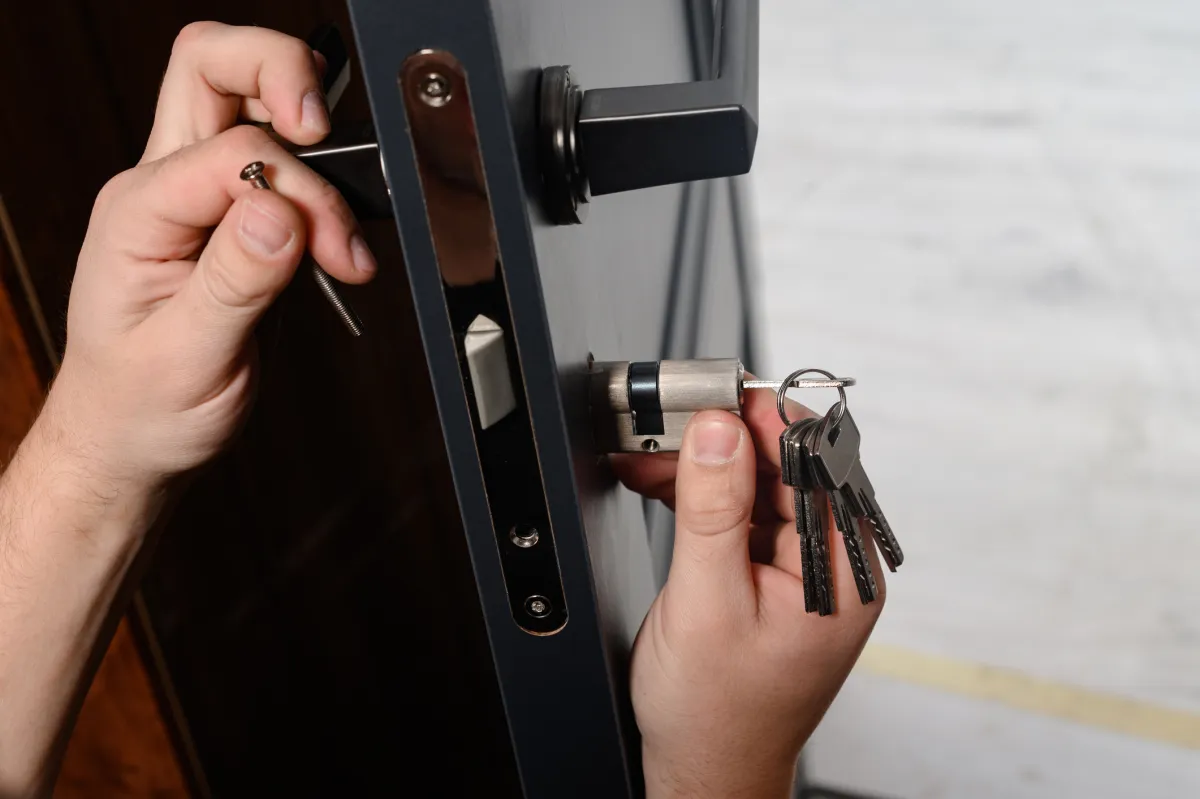 Commercial locksmith installing high-security lock system for Toronto business